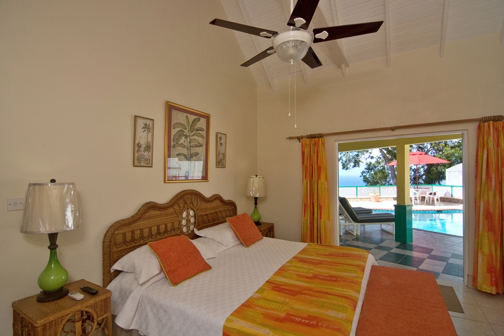 Bedroom two opens onto the pool deck